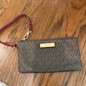 Michael Kors Brown Signature Wristlet with Pink Strap